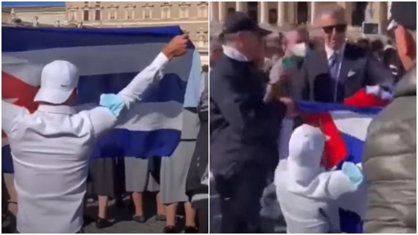 Policía retira la bandera cubana a un manifestante dentro de la Plaza de San Pedro en el Vaticano