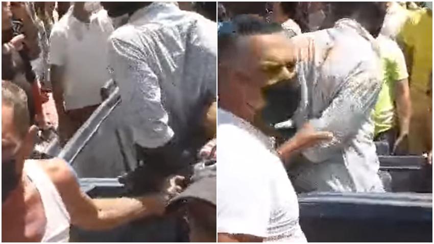 Cubanos meten en un tanque de basura a un ladrón de celulares en La Habana