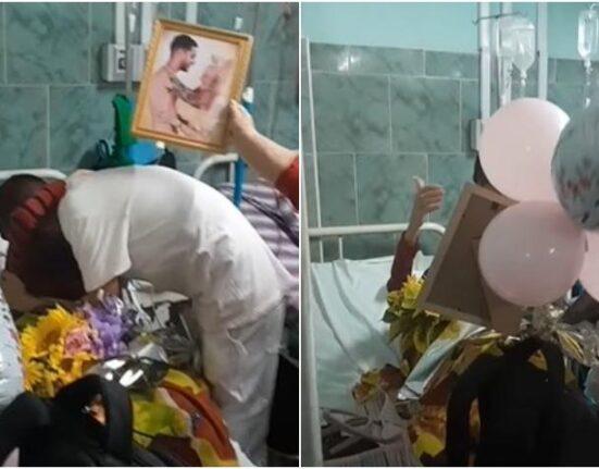 Joven cubano que se rapó la cabeza en solidaridad con su madre enferma de cáncer en octubre, ahora celebra la última sesión de quimioterapia sorprendiéndola con globos y flores y un “Te quiero Mama”