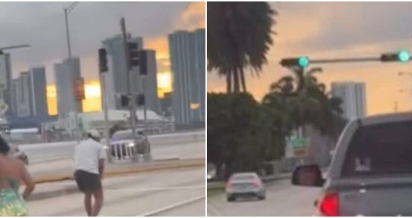 Conductores paran en autopista de Miami Beach a Miami para recoger dinero lanzado desde un auto dinero-autopista-miami