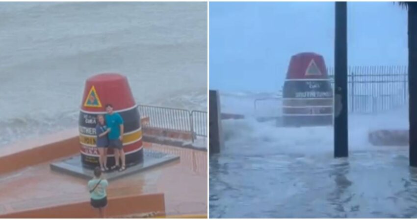 Turistas se toman fotos junto a la boya de las 90 millas a Cuba en Key West desafiando la tormenta turistas en la boya de Key West-huracán Helene