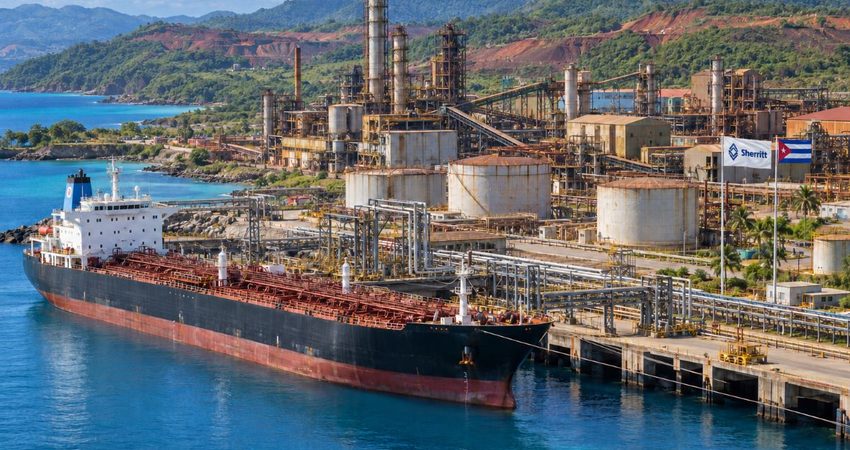 Sherritt obtiene luz verde de EE.UU para enviar combustible a Cuba, pero aún no puede reiniciar la producción Banderas cubana y Sherritt en el muelle
